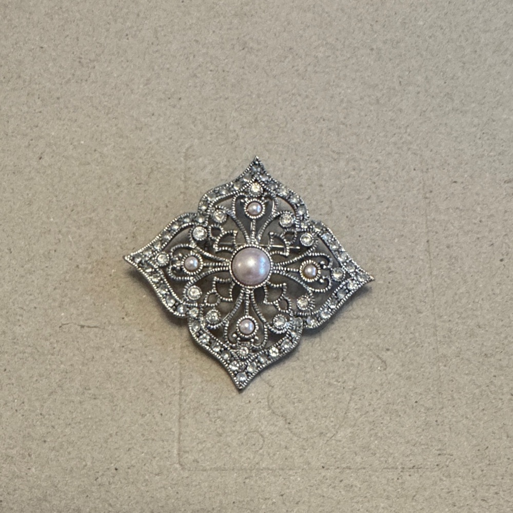 Elegant Silver and Pearl Brooch